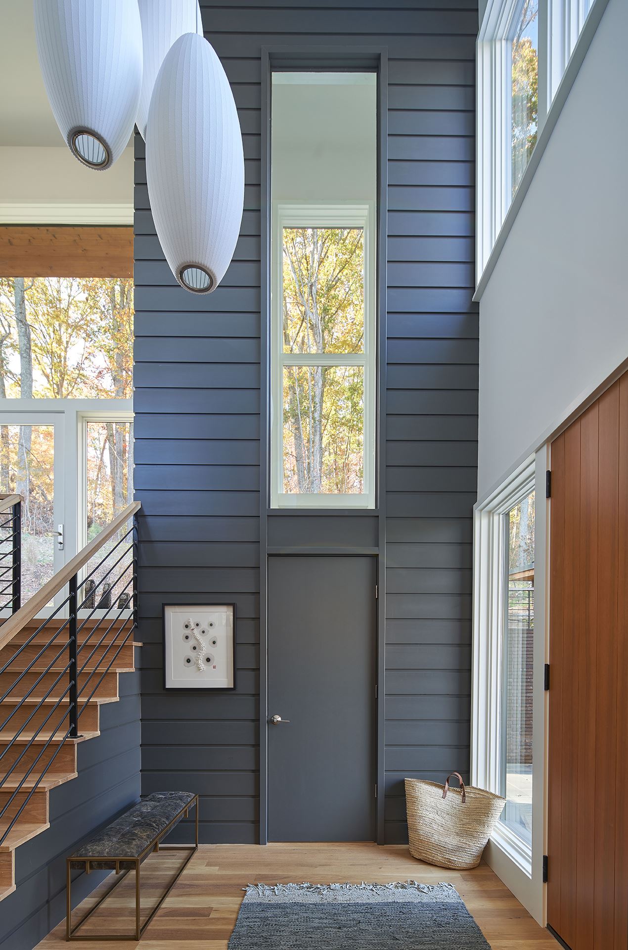 Tall entry wall featuring blue gray Savannah Smooth planks